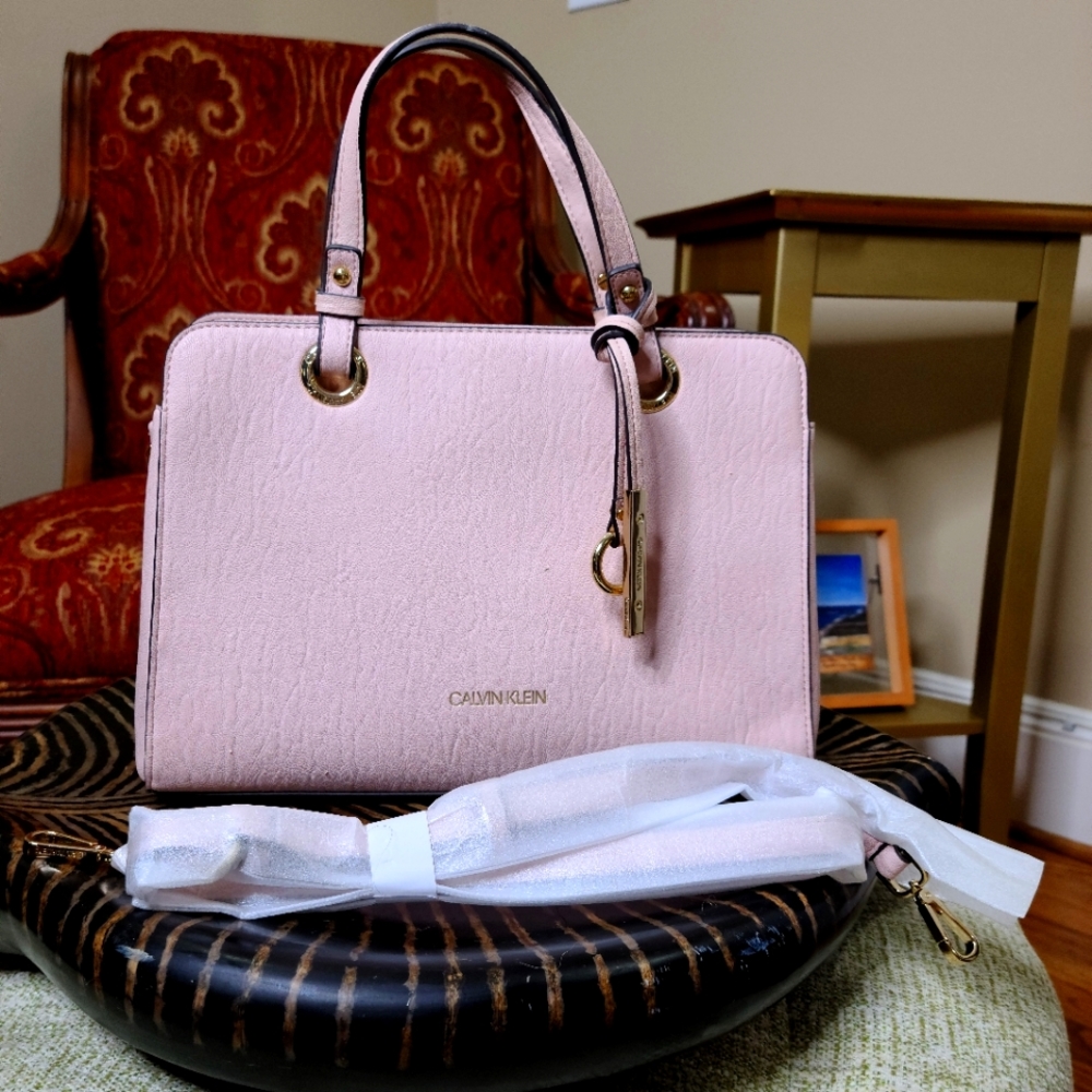 Pink Calvin Klein purse with new strap